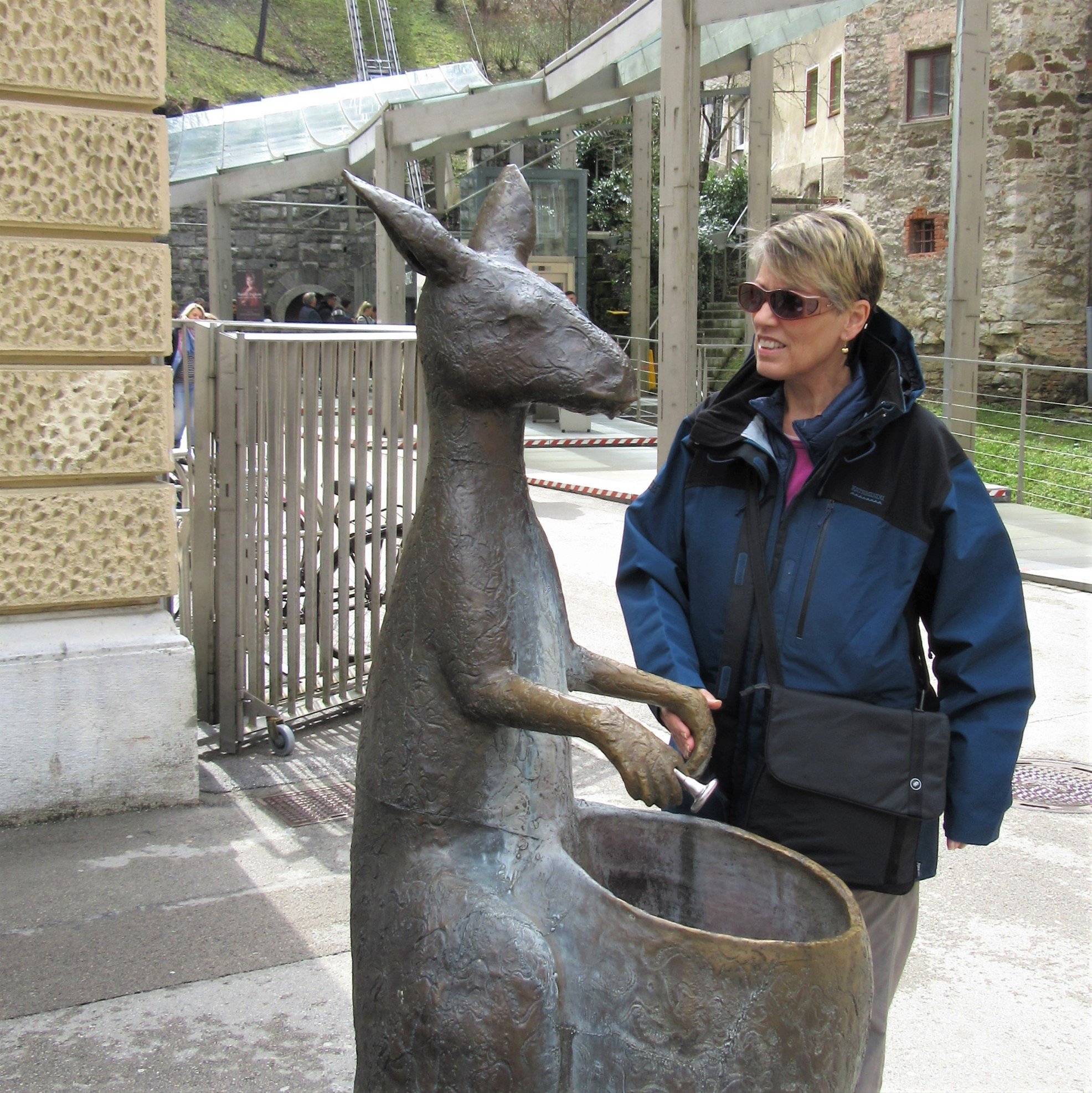 Marlene beside Skippy Kangaroo bronze drinking fountain, Ljubljana, Slovenia, 2018