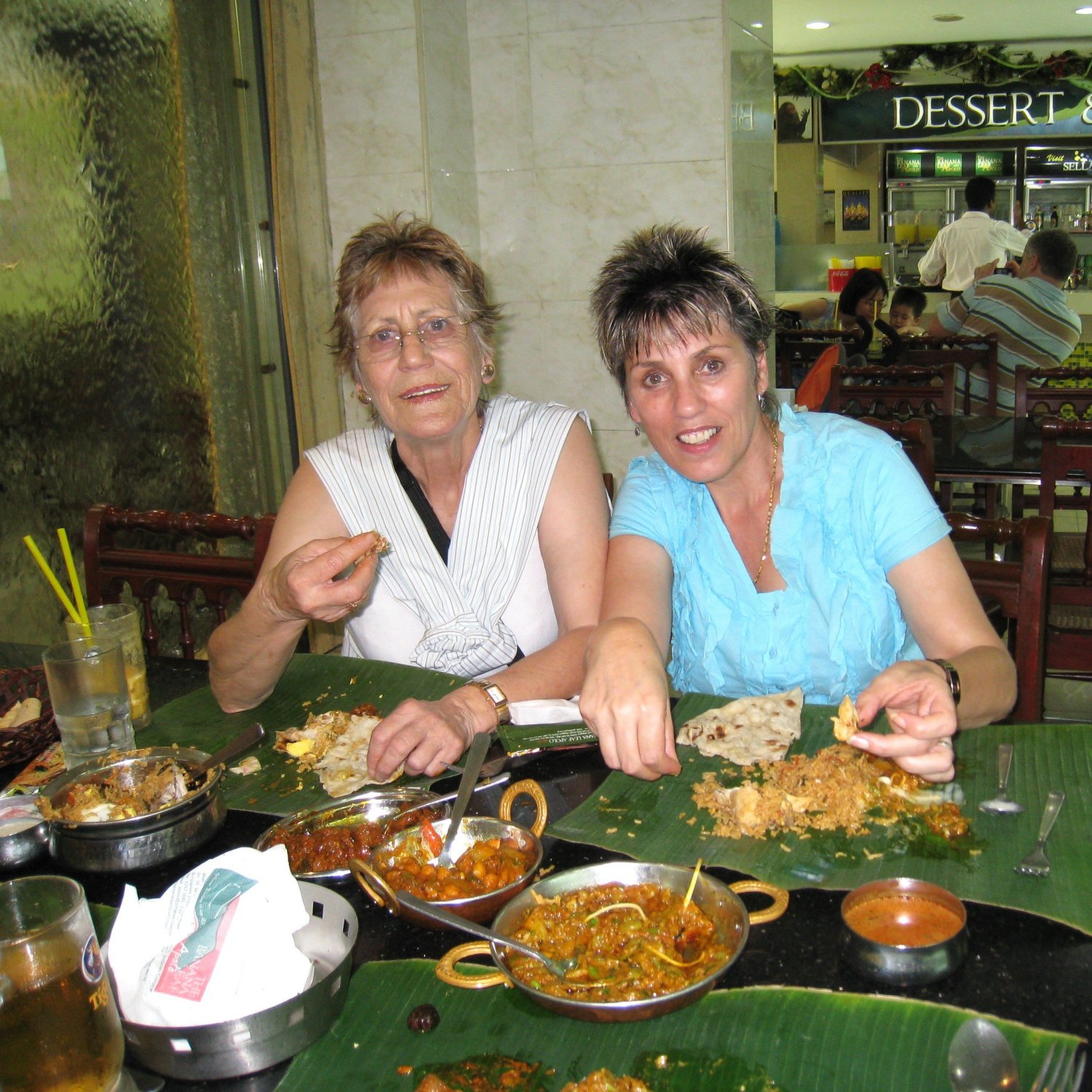 Marlene and her Mother, enjoying Indian cuisine in Singapore, 2010