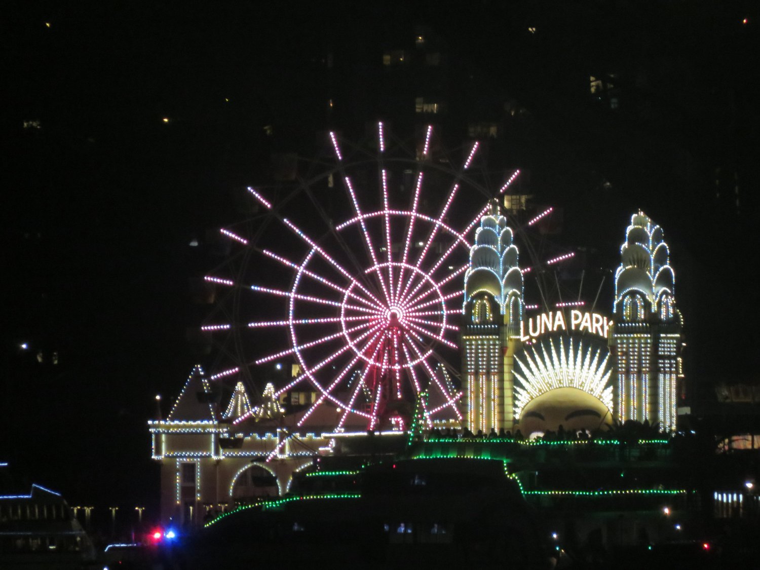 A night view of the lights of Luna Park, on the northern side of Sydney Harbour