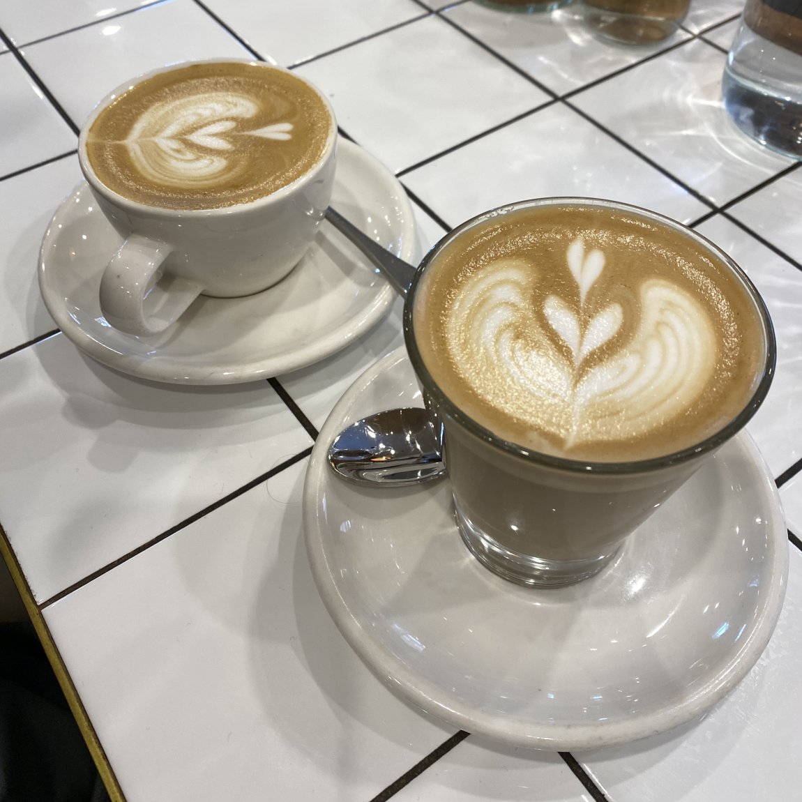 An image of two cups of coffee, taken at Pango Coffee