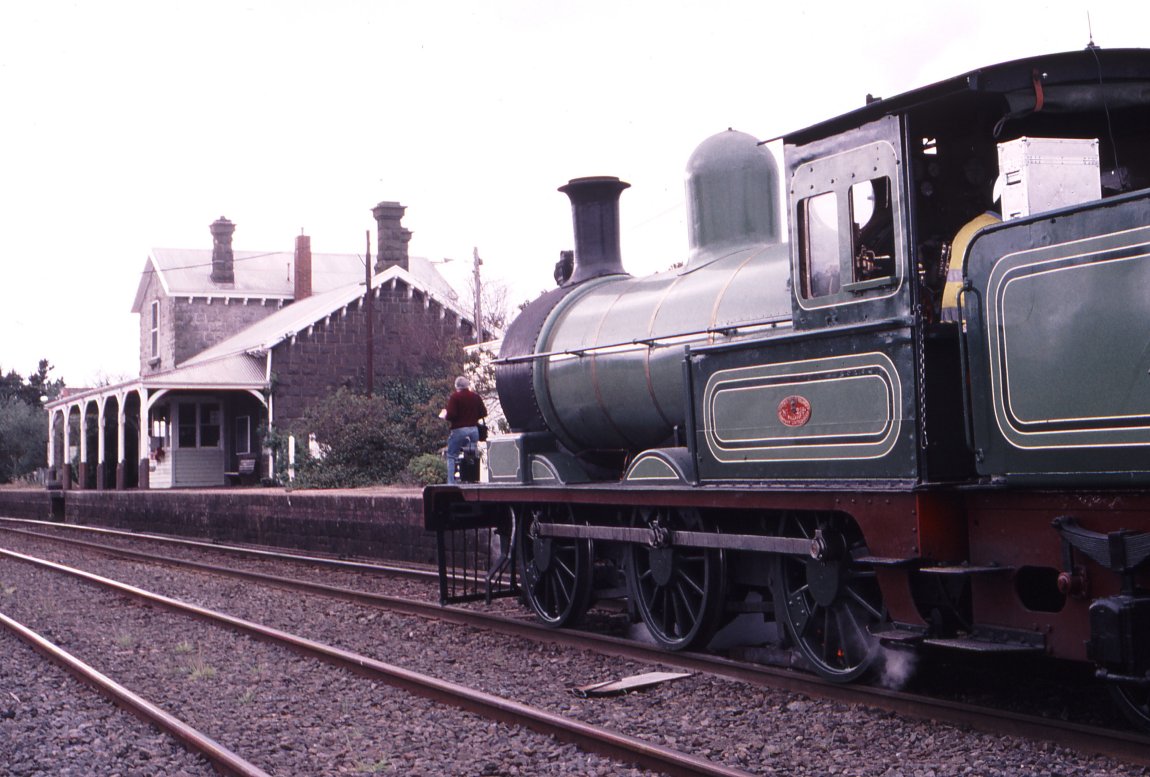 An image by photographer Weston Langford, showing Steam Train Y112 at the Meredith Train Station, taken in May 1996