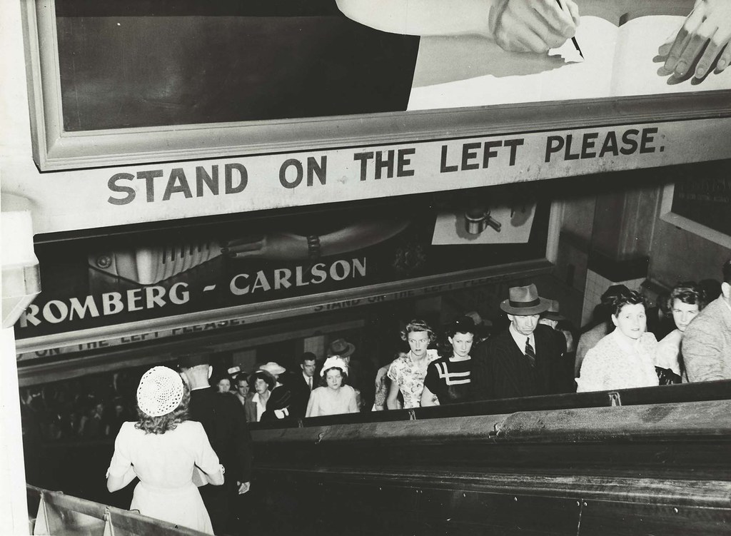 Image of rail commuters on the Wynyard Station escalator, 25 February 1948