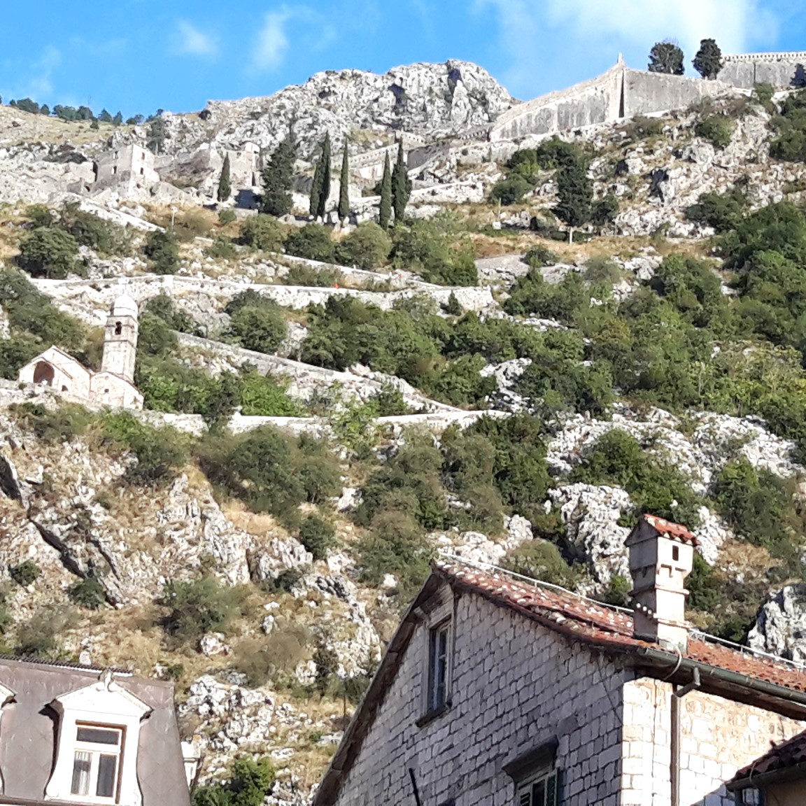 image of the Ladder of Kotor, as it climbs up the mountainside from the City to the Fortress of San Giovanni