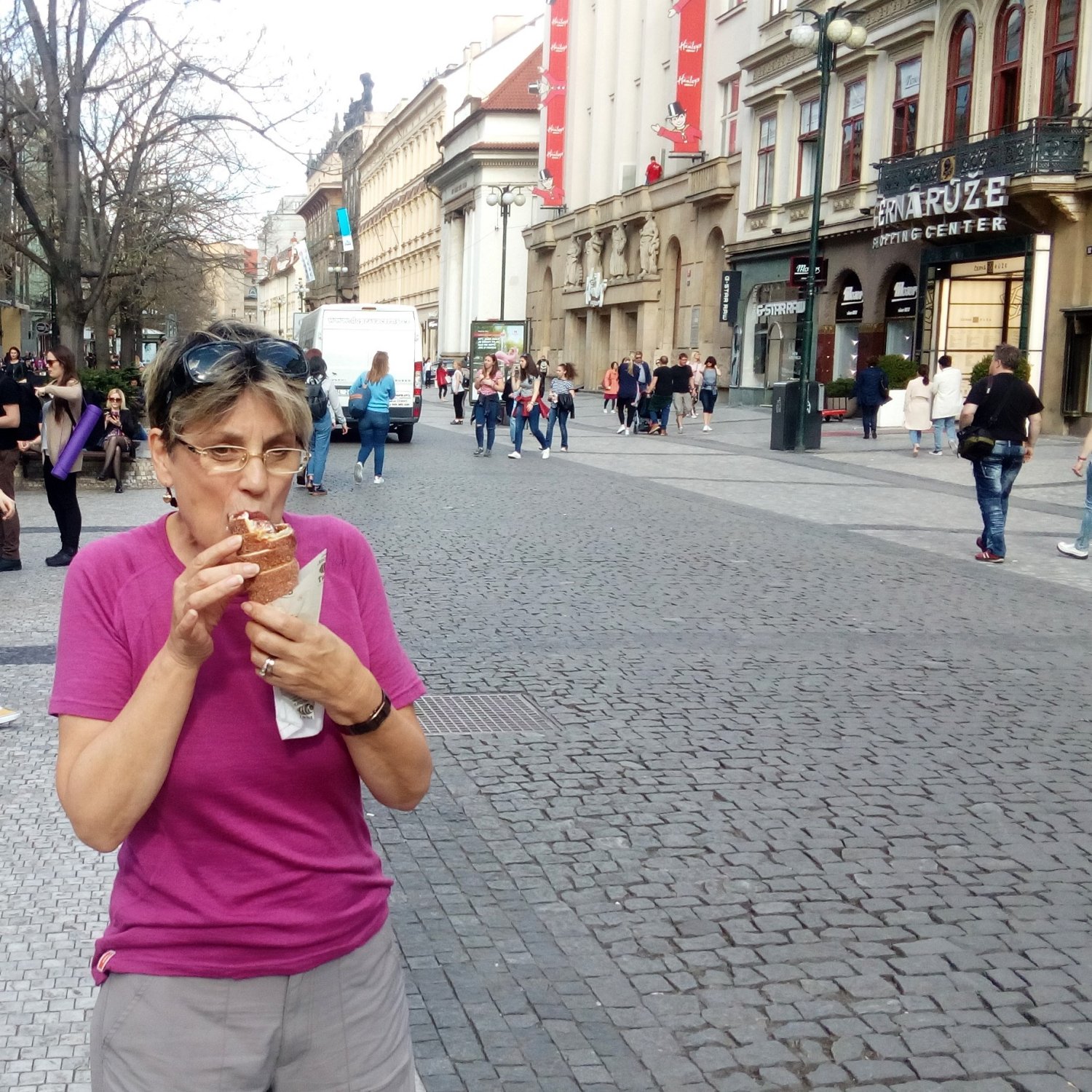 image of Marlene enjoying a český trdelník (chimney cake) in Prague