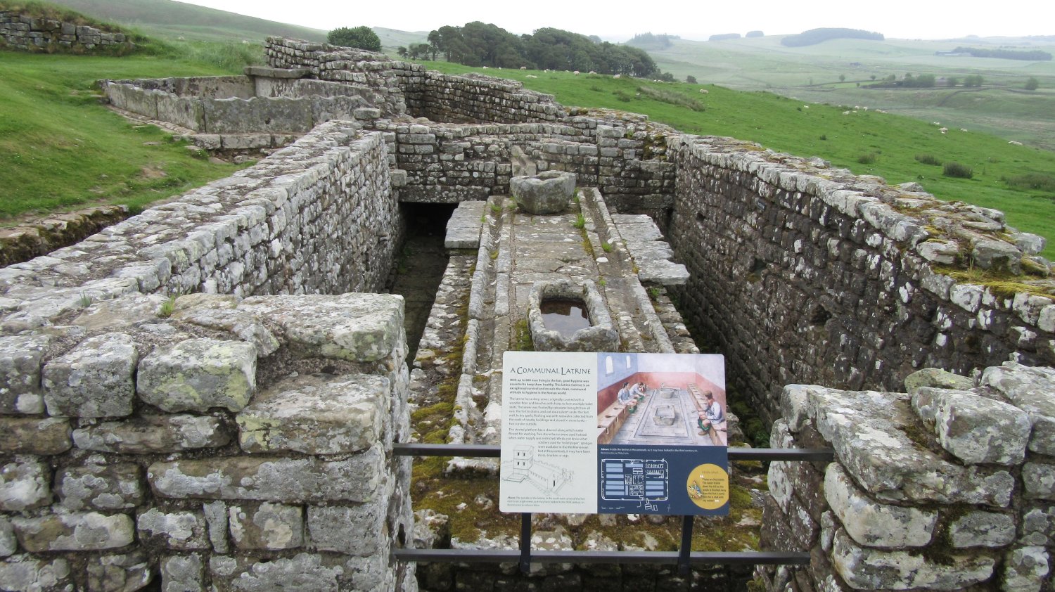 Image of the ruis of a Roman-era communal latrine on Hadrian's Wall (Scotland)