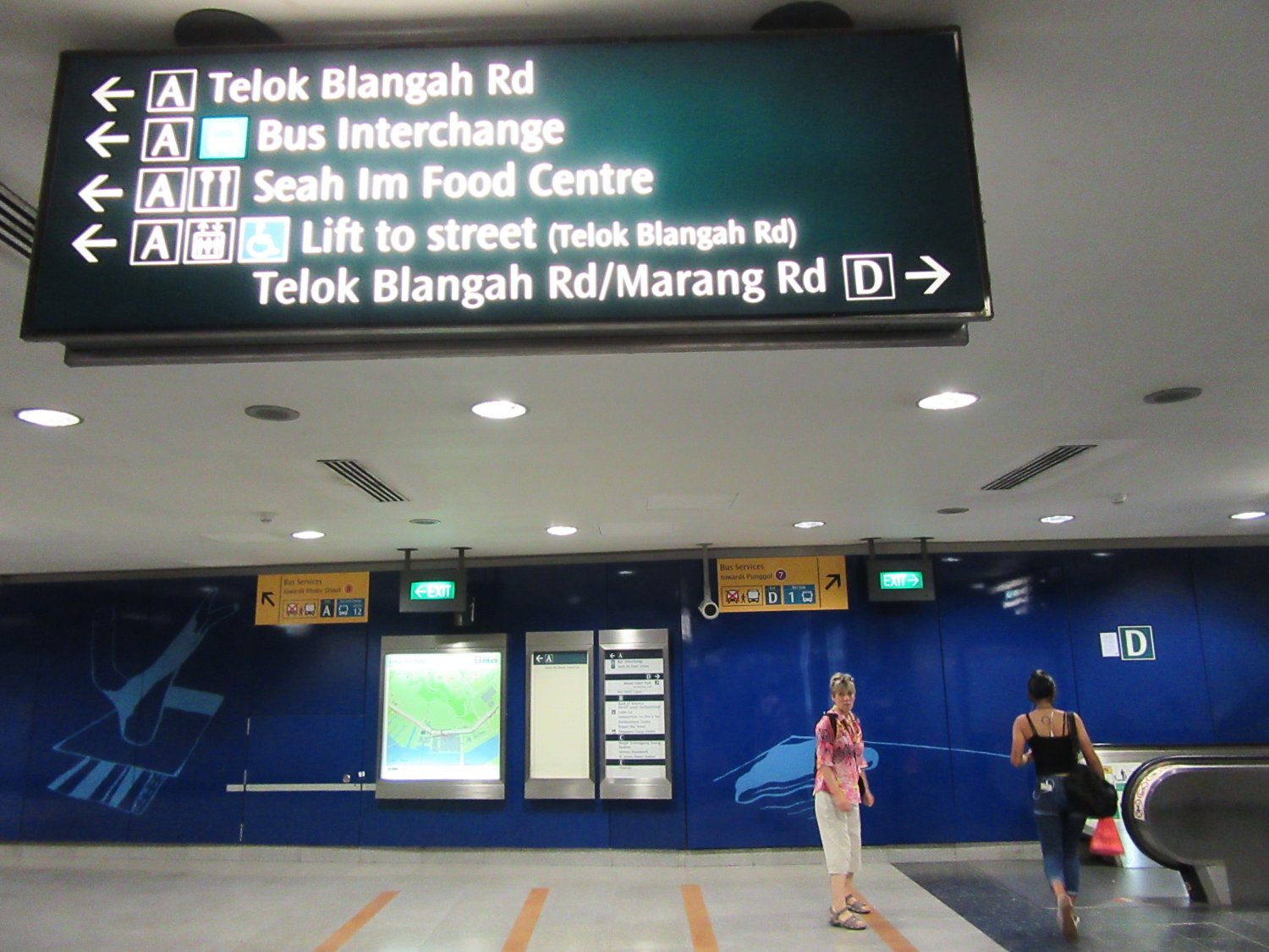 Image of signage in the Telok Blangah train station (Singapore)