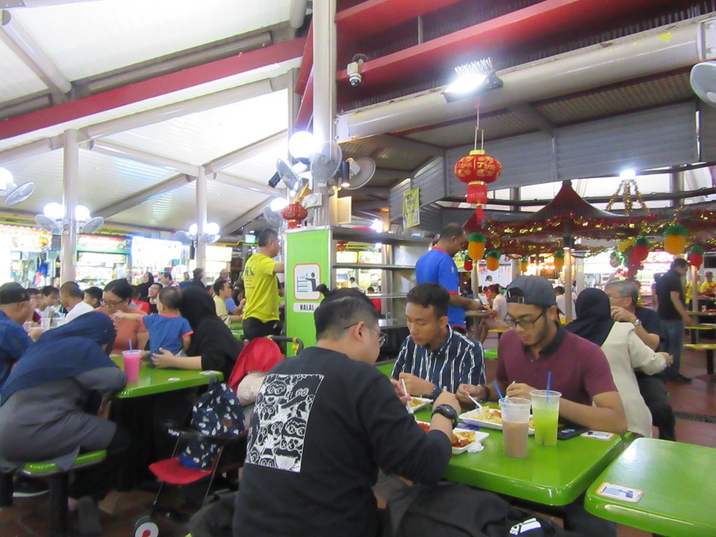 image showing patrons at the Adam Road Food Centre, Singapore