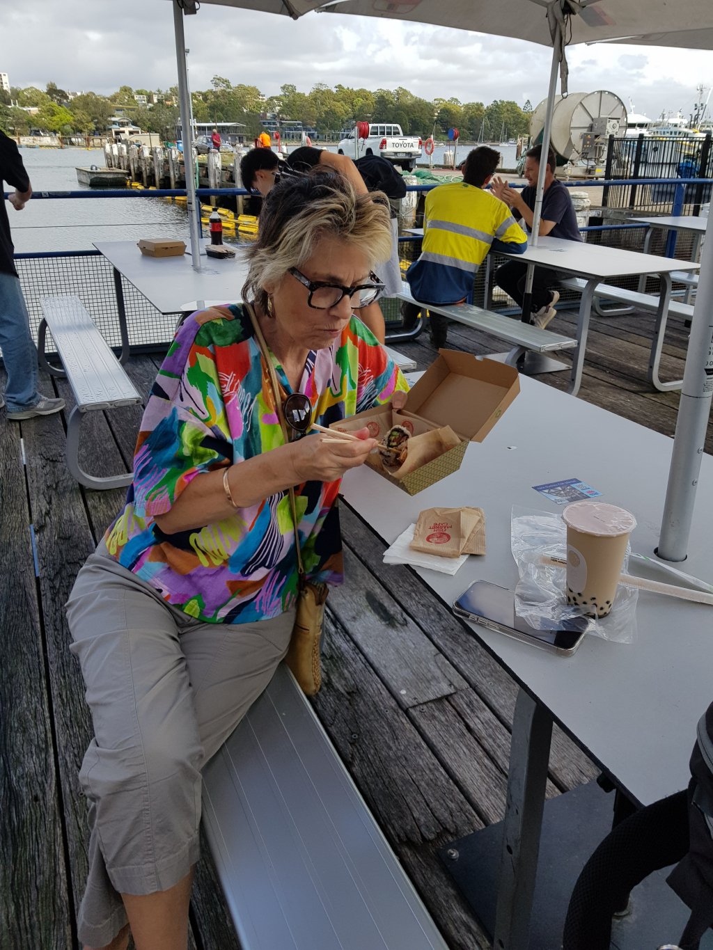 Image of Marlene having a snack at the (old) Sydney Fish Market