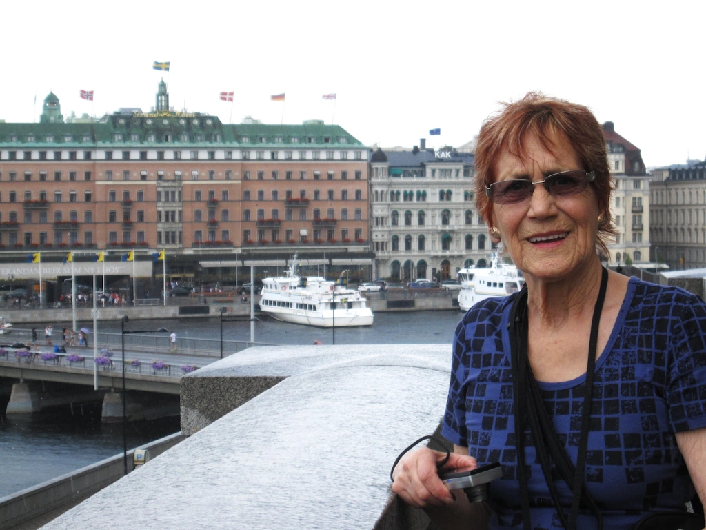 image showing Marlene's Mum in Stockholm, with the historic Grand Hotel in the background, 2013